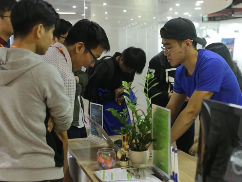 Two TechHub engineers reviewing code together before a release